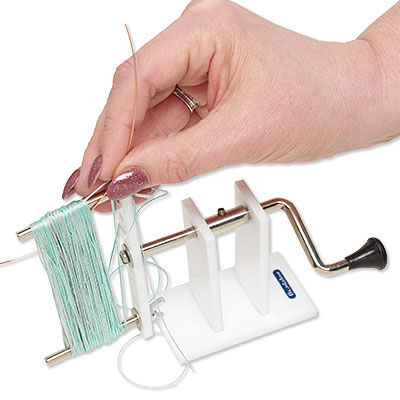thread wrapped on tassel maker